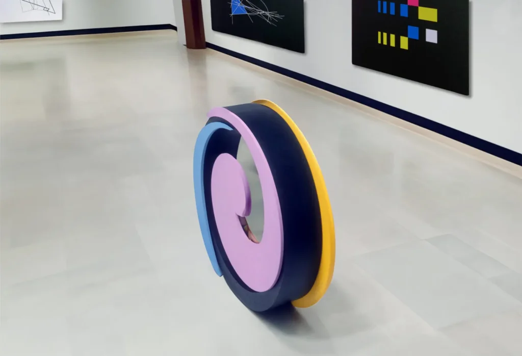 Pastel ring sculpture on gallery floor