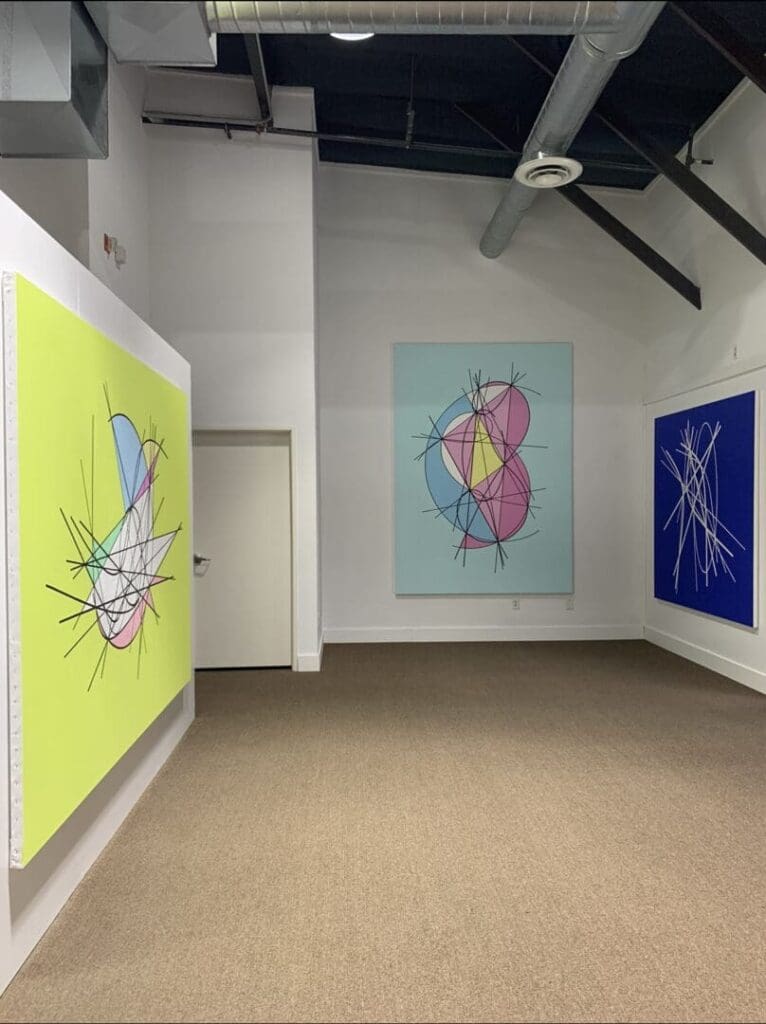 Abstract art in a modern gallery setting.