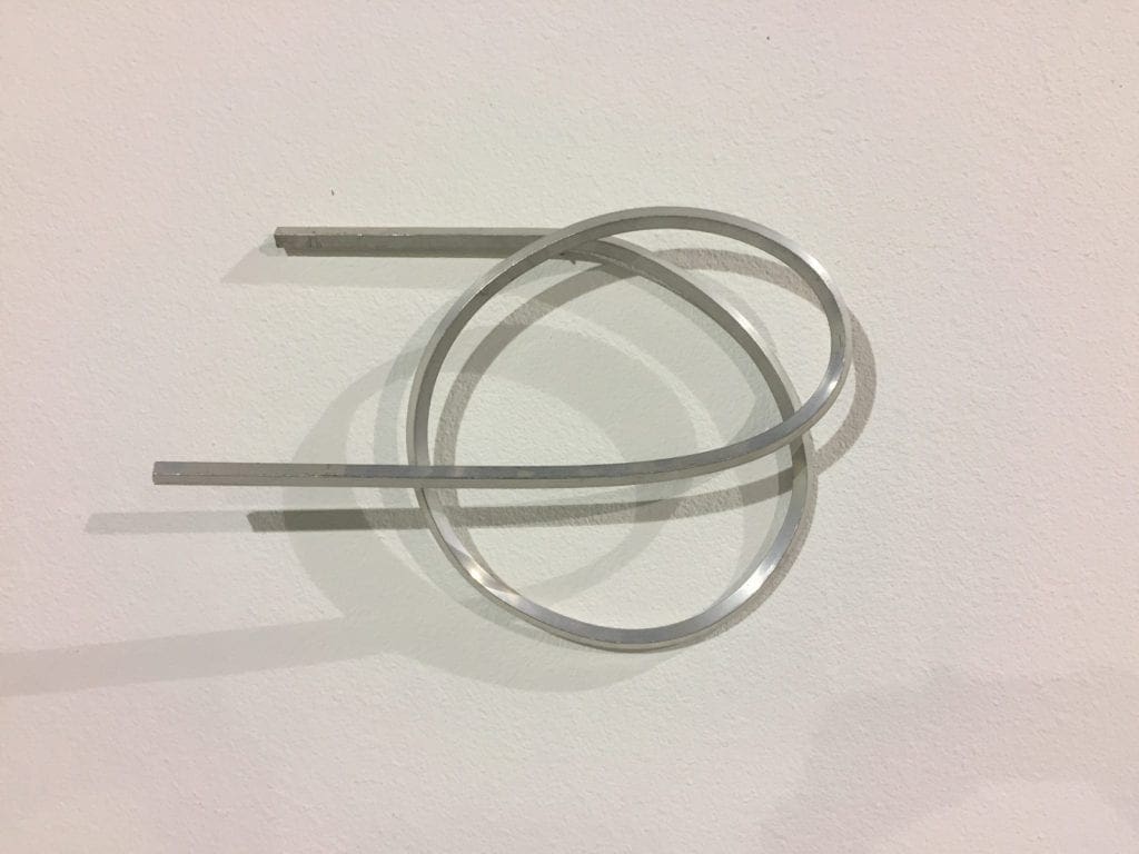 A pair of metal wires on top of a table.