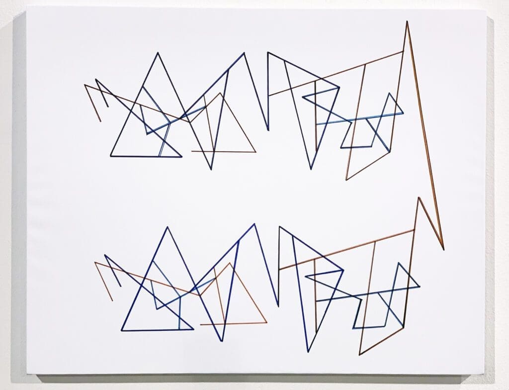 A white sheet with some blue and orange lines on it