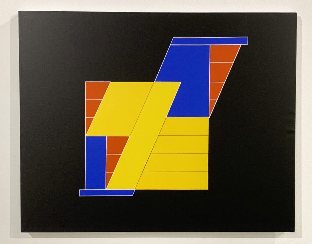 Minimal black field framing colorful angular shapes