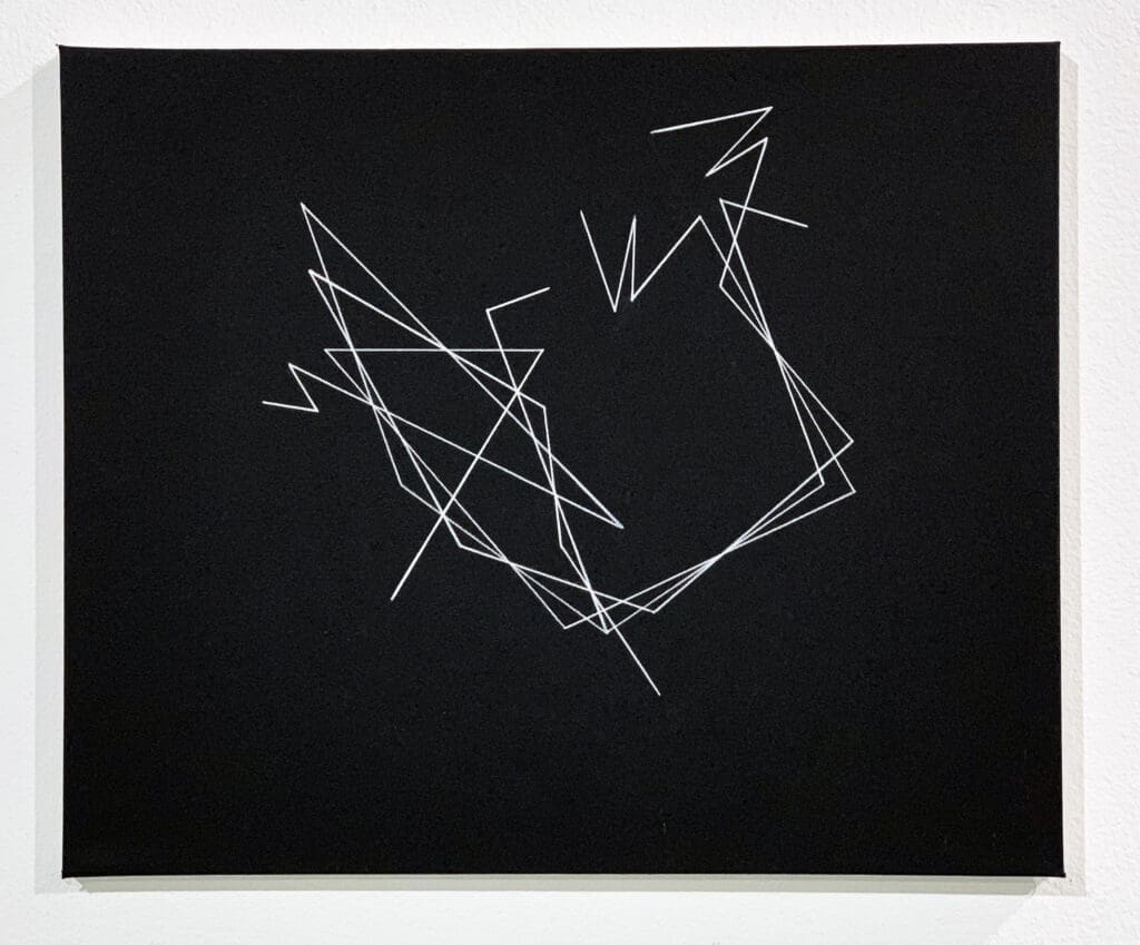 Intersecting white lines creating starlike shape
