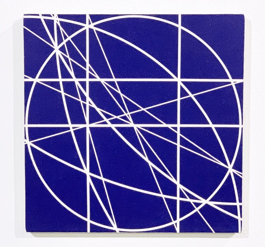 White grid and intersecting lines on blue