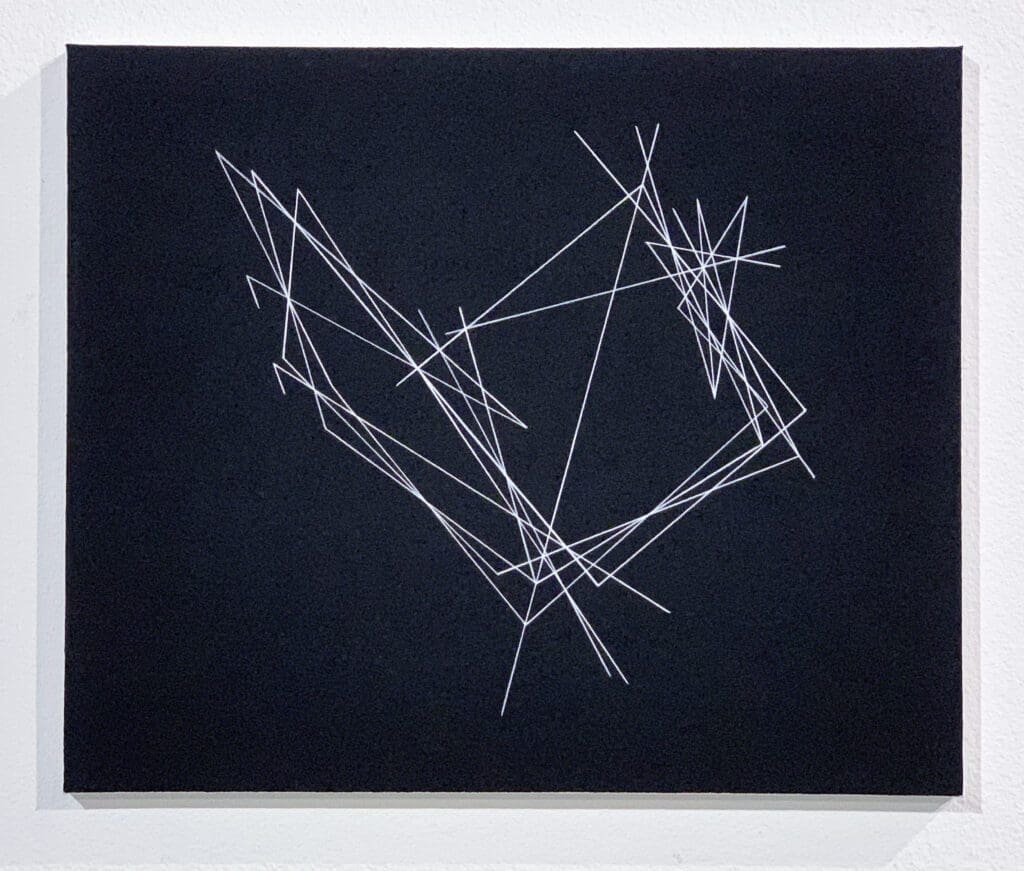 Geometric white lines forming abstract shape