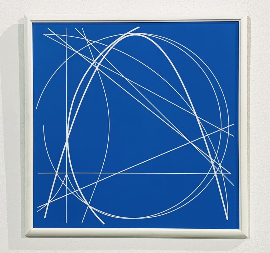 Framed blue panel with sweeping white curves