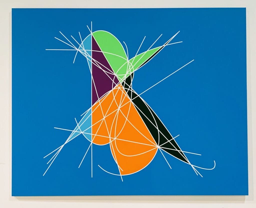 Sharp white lines over blue field and shapes