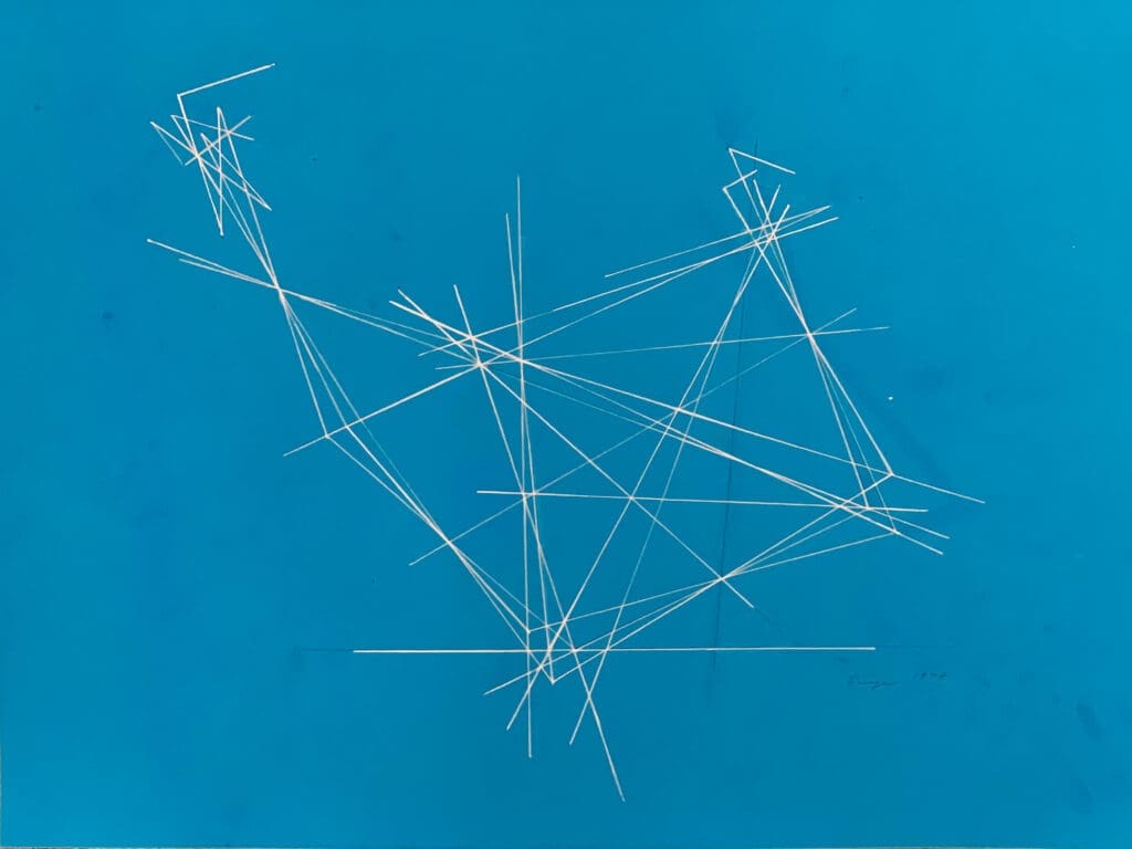 White abstract geometric lines on a blue background.