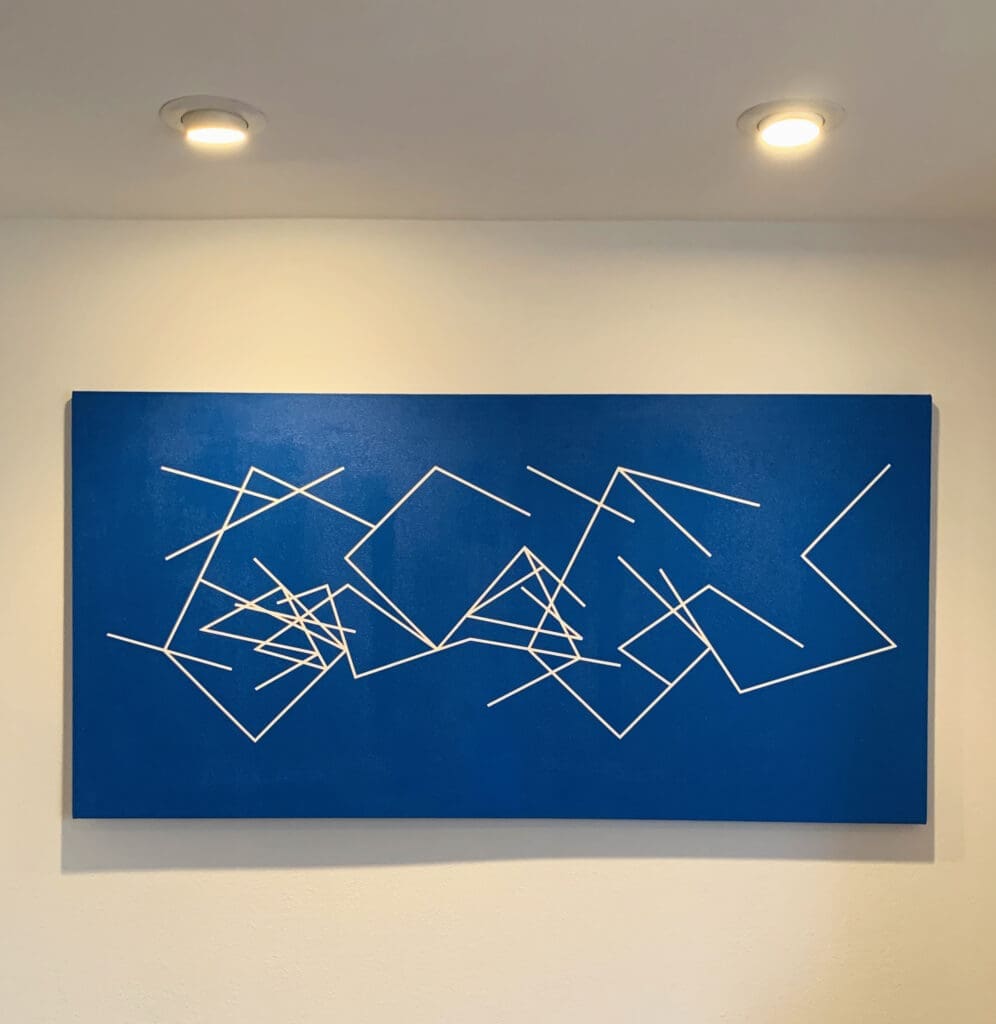 Abstract geometric line art on a blue canvas.
