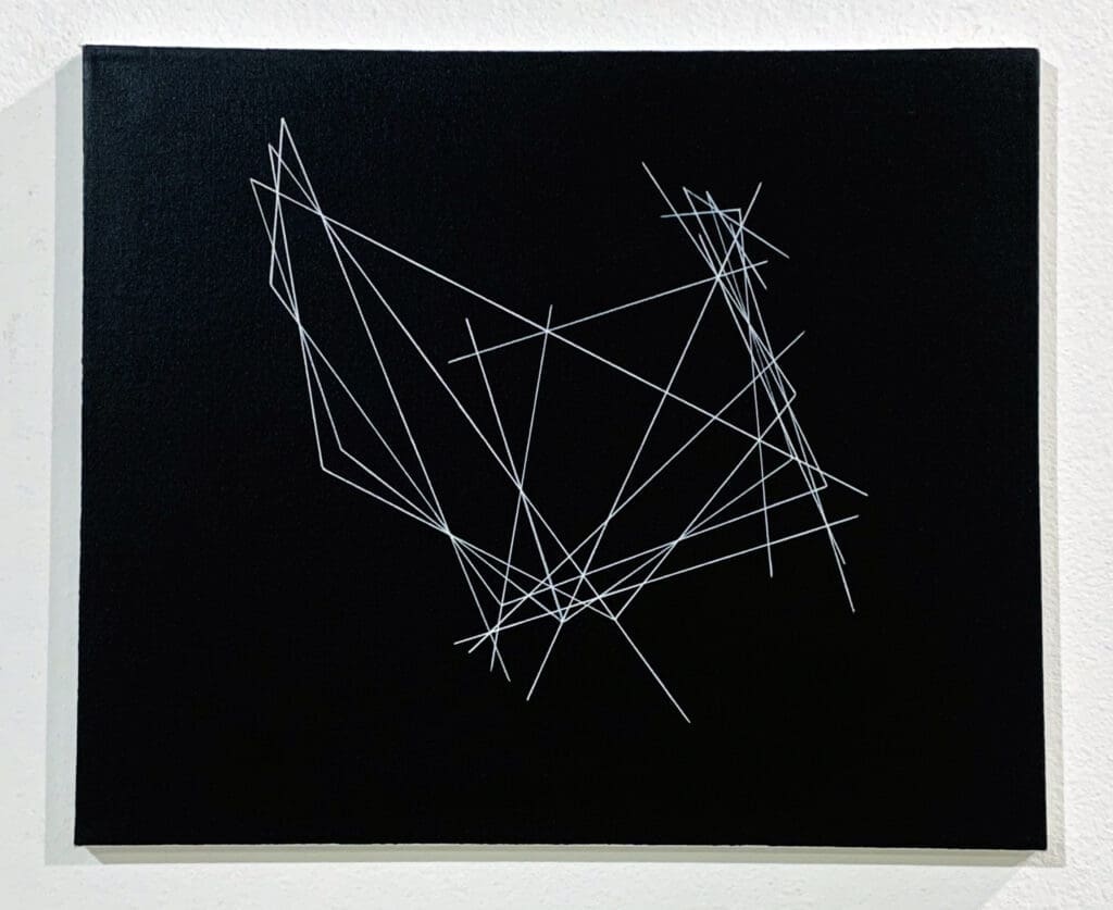 Abstract white lines intersecting on a black background.