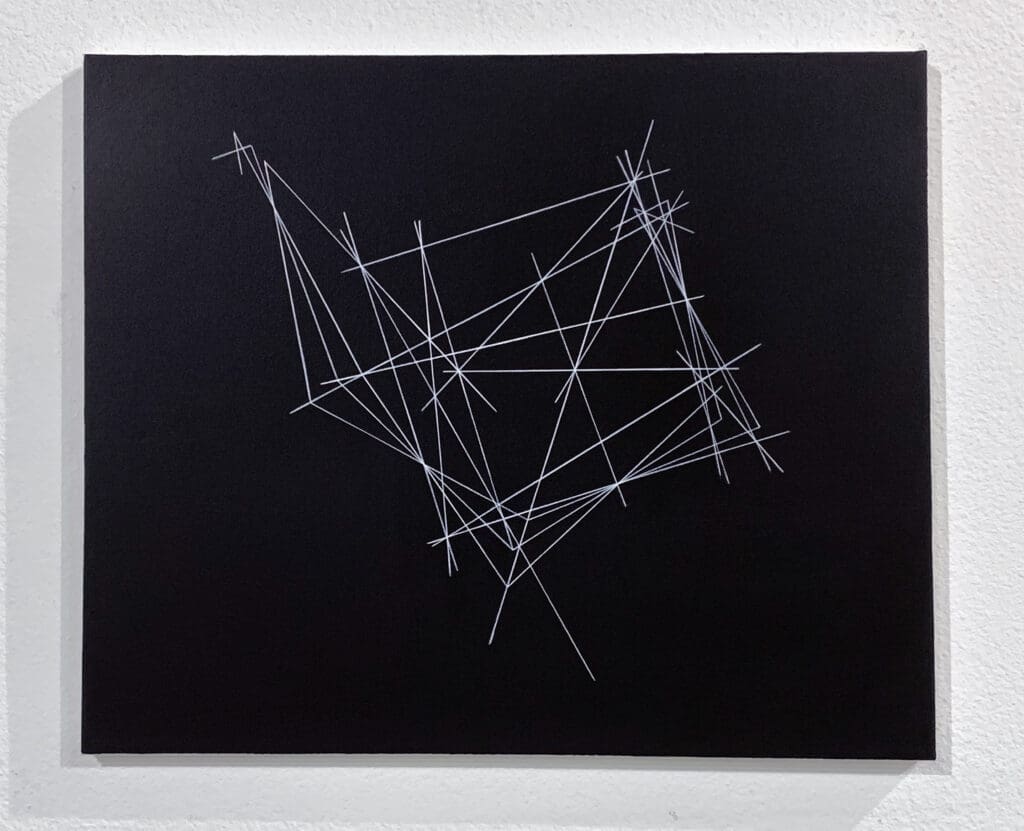 Abstract geometric lines intersect on a black canvas.