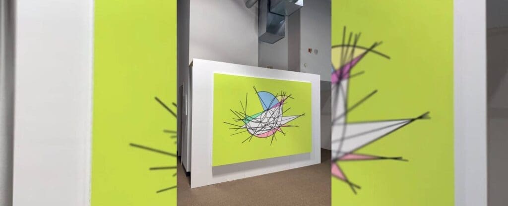 Colorful bird artwork on a bright green background displayed in a gallery.