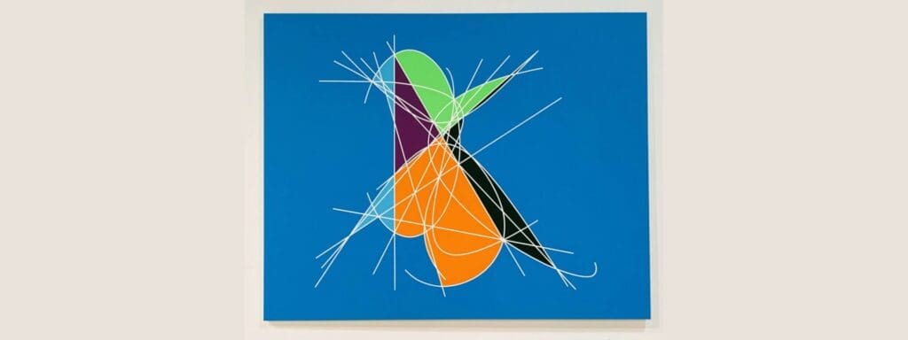 Abstract geometric shapes in bold colors on a blue background.