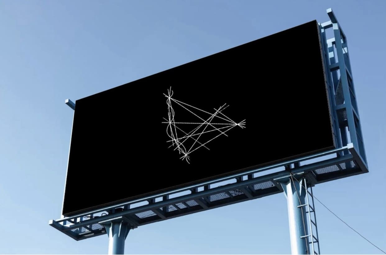 Billboard displaying a minimalist white geometric design on a black background.