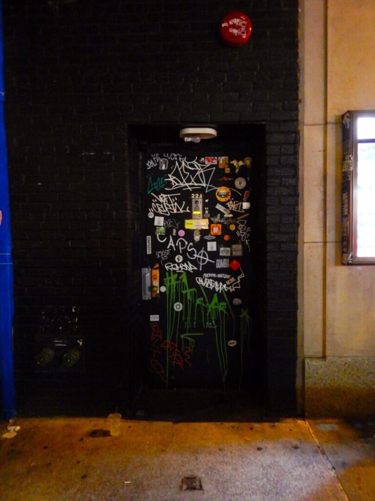 Clifford Singer. Building Entrance. NYC. 2025