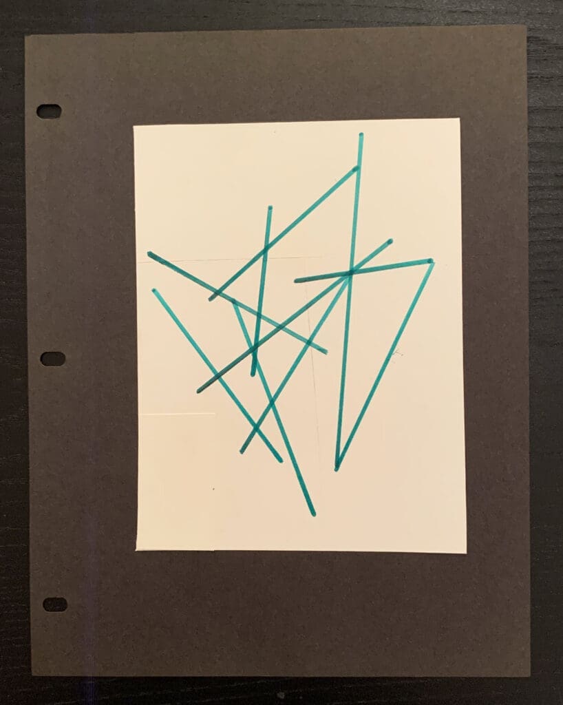 Abstract green line drawing on white paper.