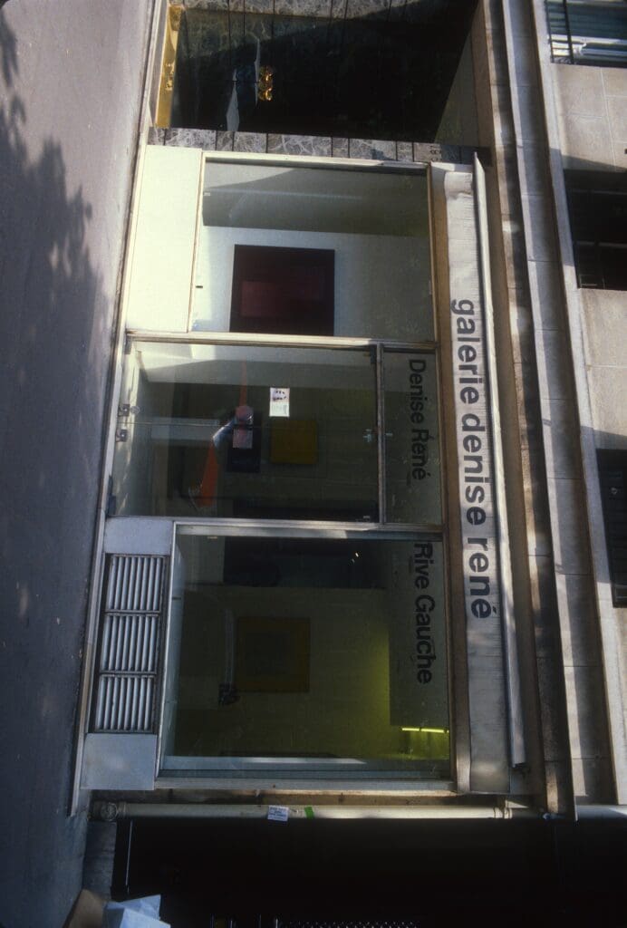 Entrance to a building labeled as Instituto Carlos III.