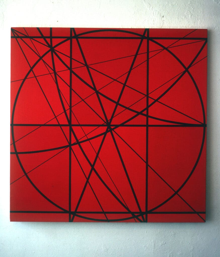 Red abstract painting with intersecting black lines.