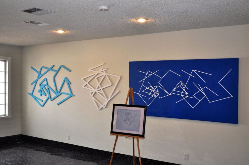 Abstract geometric art displayed in a gallery.