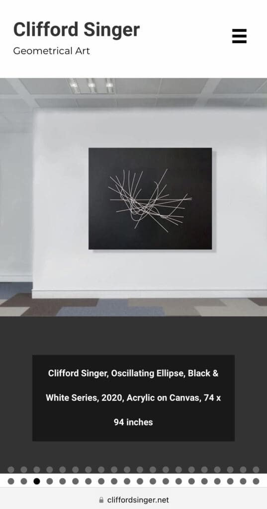 Geometrical art piece on gallery wall.