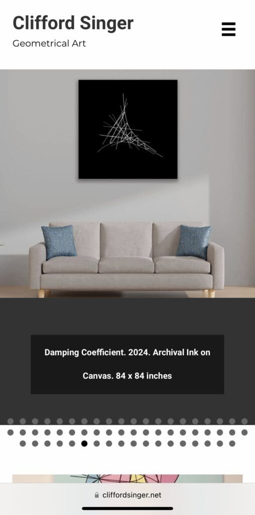 Geometrical art above modern sofa.