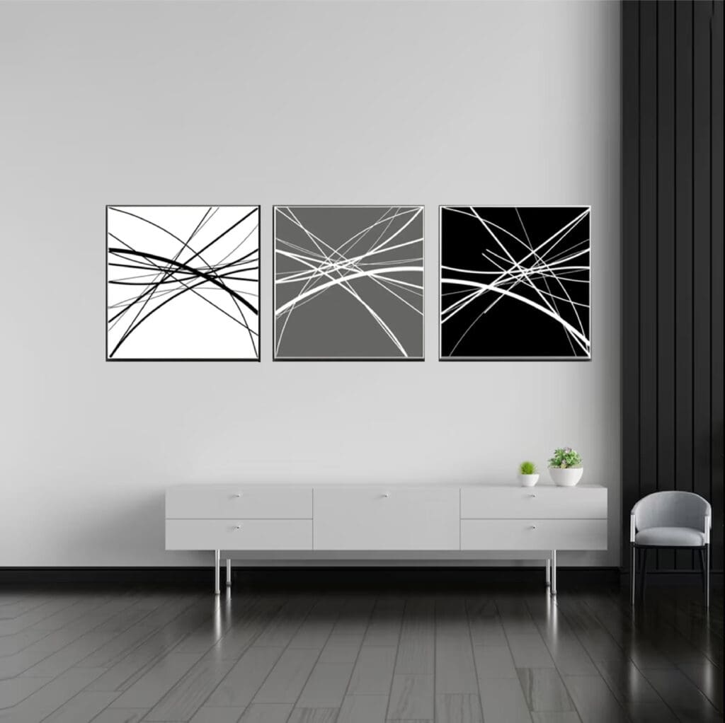 Abstract art on wall above modern sideboard.