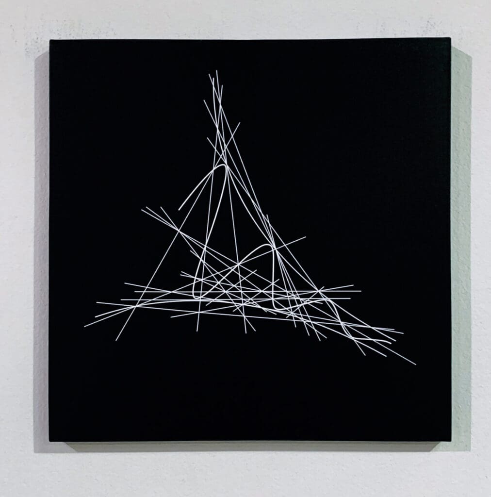 Black canvas with crossed white oscillation lines