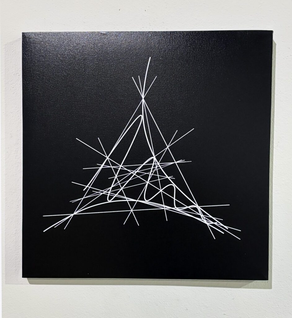 Abstract white lines forming triangle on black canvas