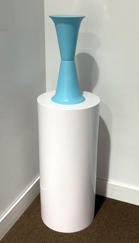 Small turquoise hourglass form on pedestal