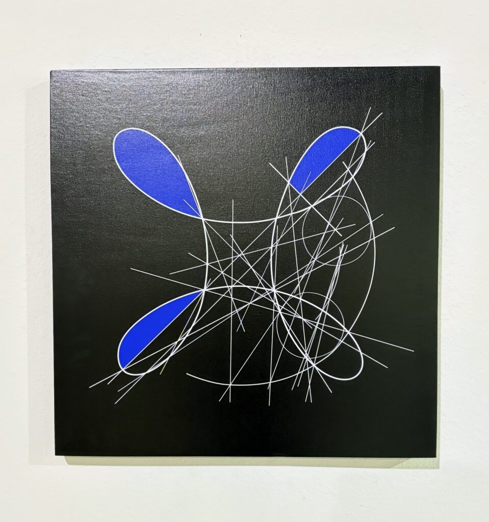 Four blue lobes with white geometric lines