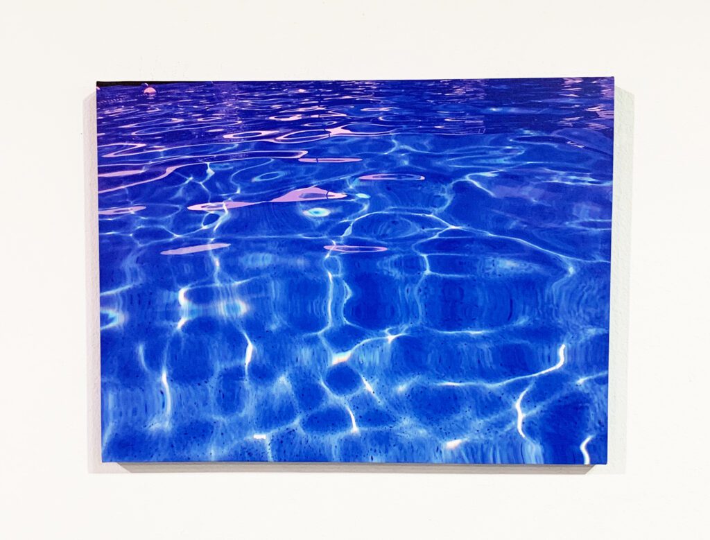 Shimmering blue swimming pool surface