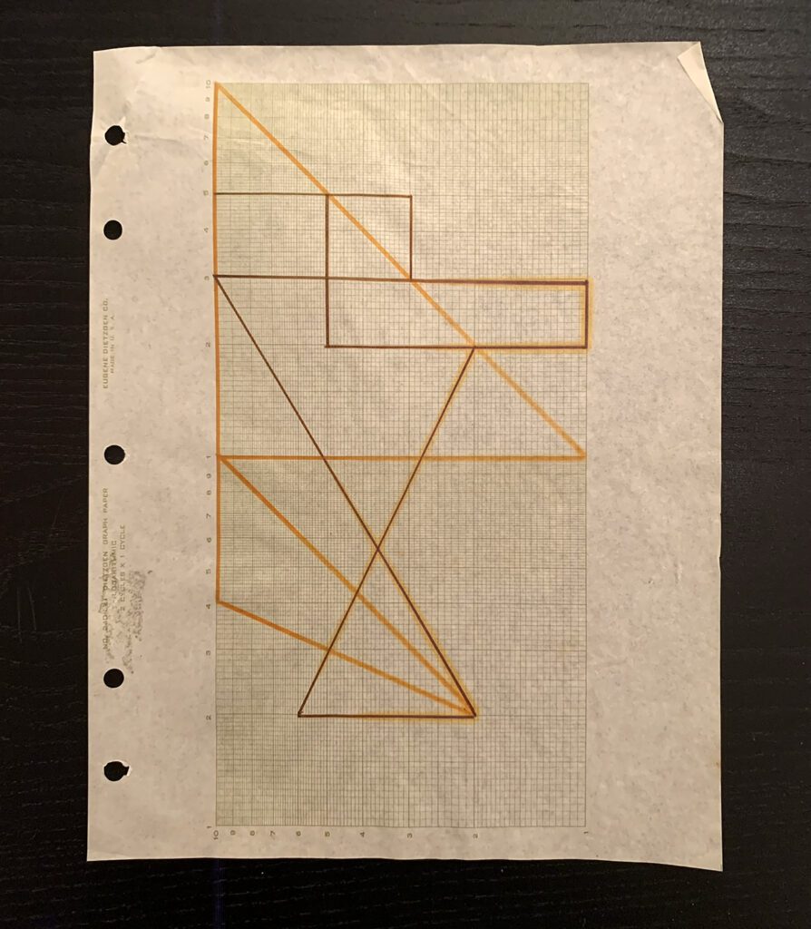 Graph paper drawing with orange geometric triangles
