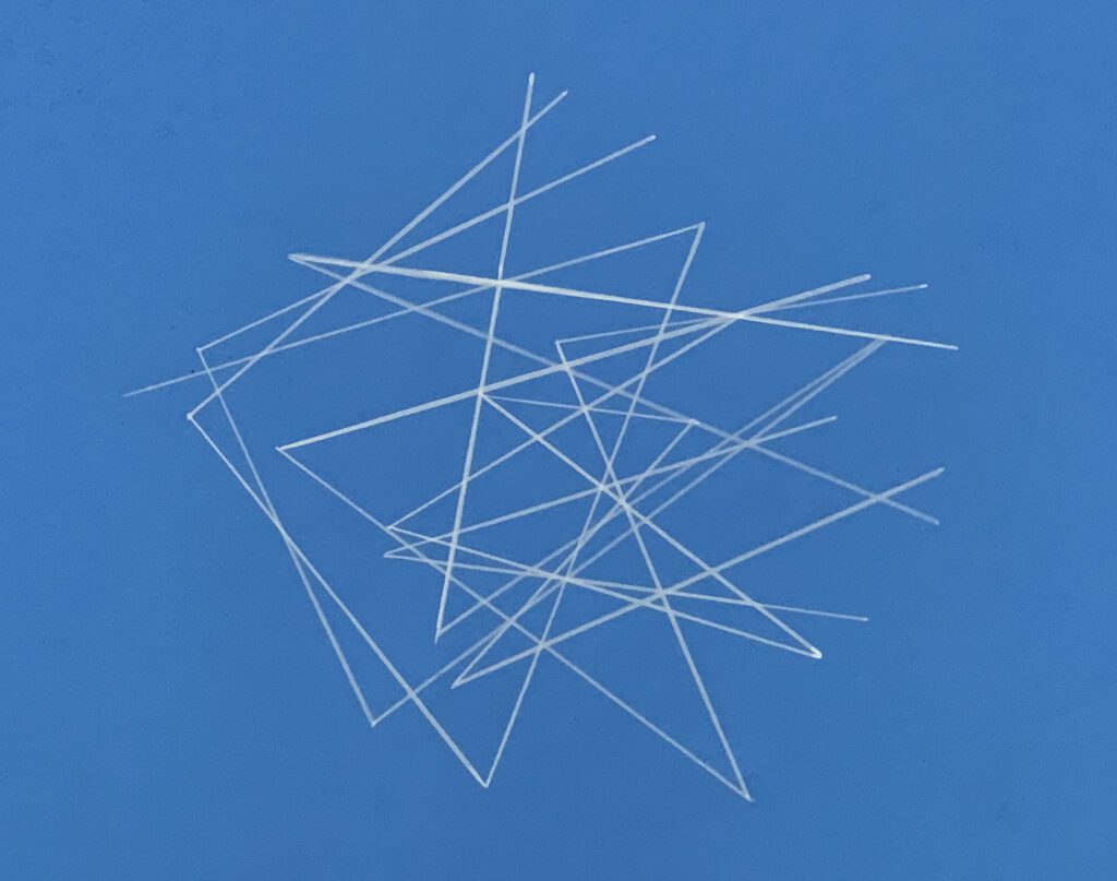 White intersecting lines on blue background