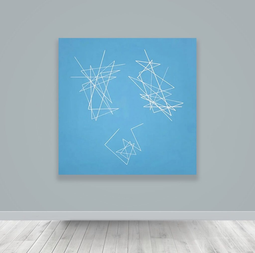 Gallery wall showing blue painting with three clusters