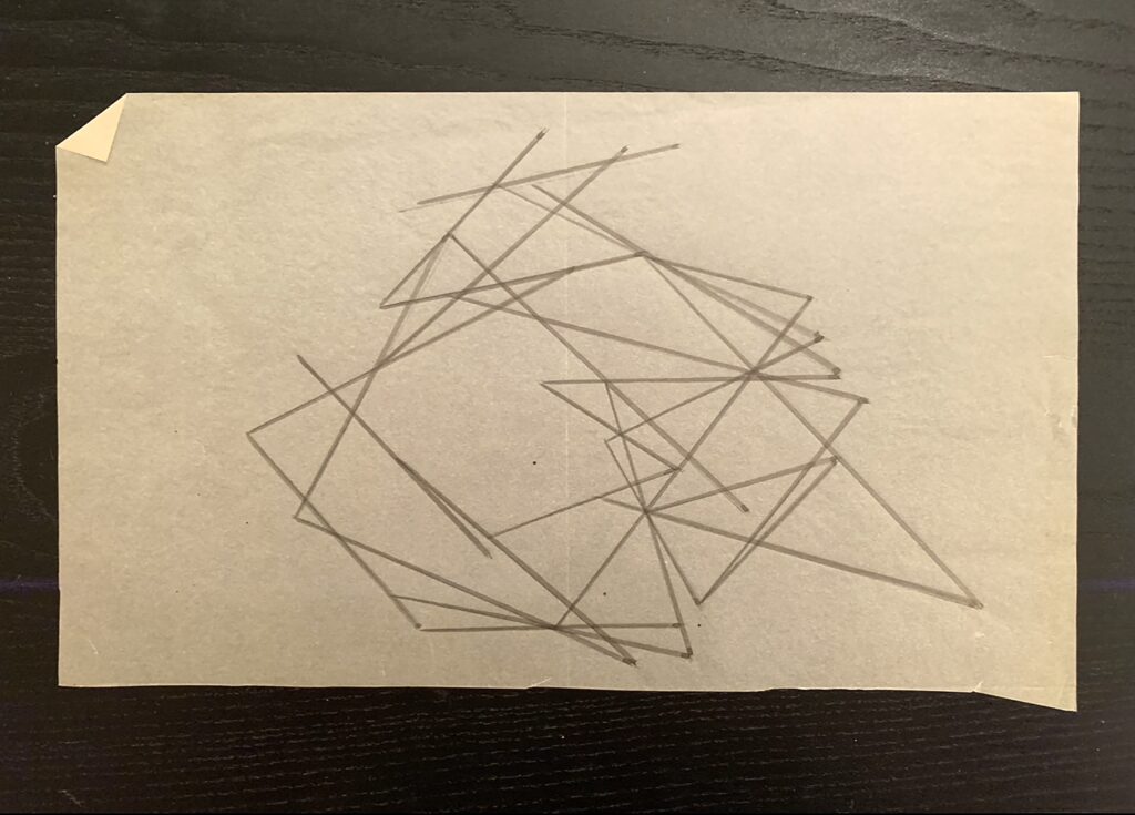 Tracing paper with intersecting geometric pencil lines