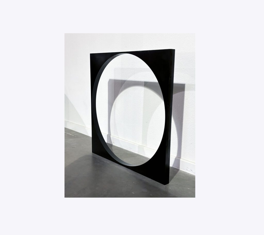 Black square frame with circular cutout