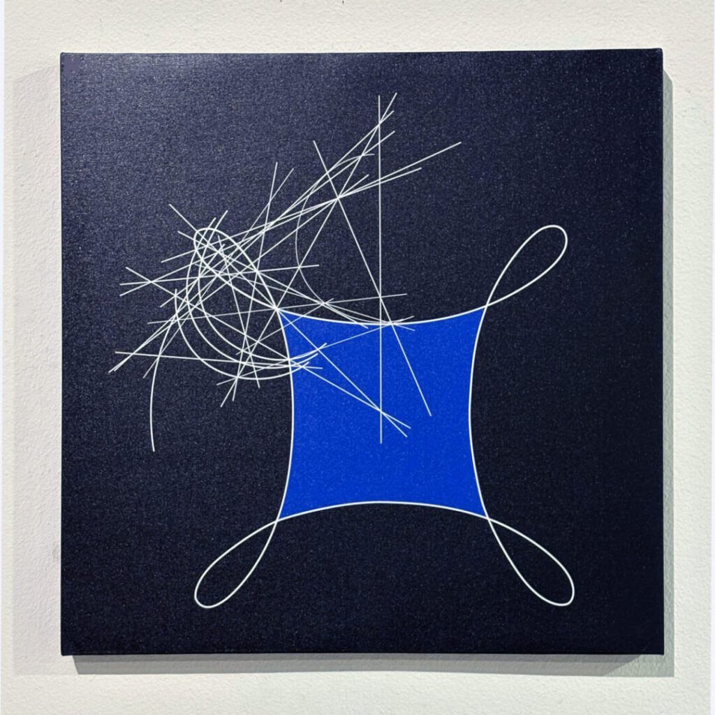 Abstract navy canvas with blue shape and scribbles
